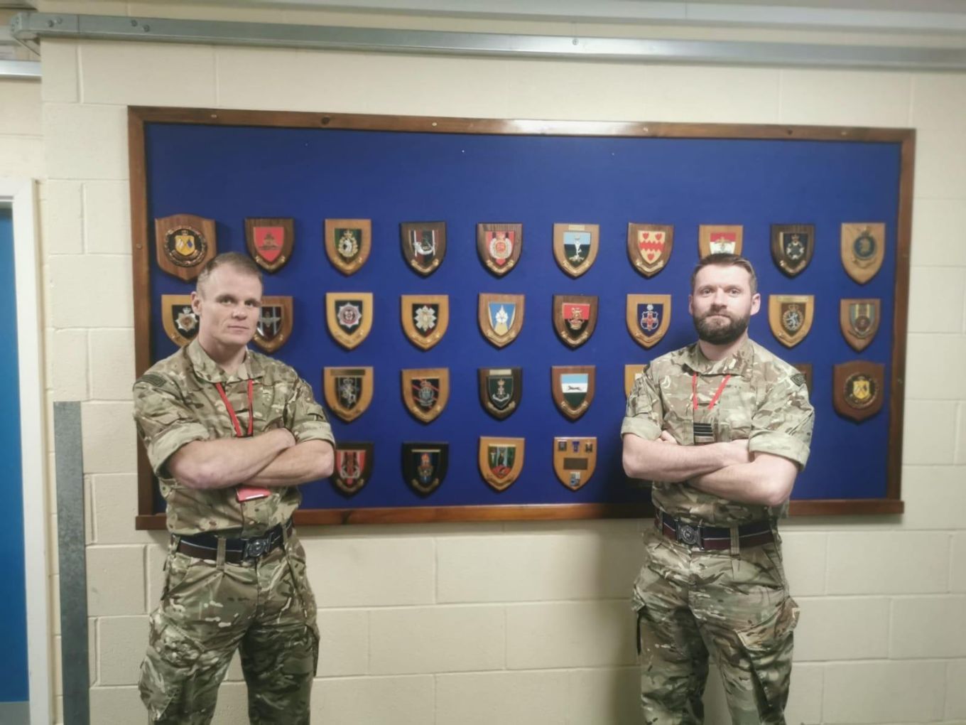 Image shows Flight Lieutenants Clarke and Coatsworth with their arms folded.
