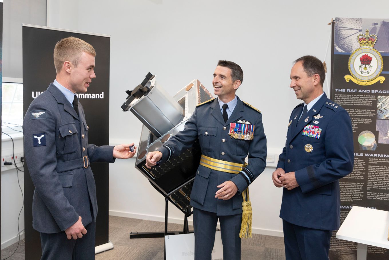 Air Vice-Marshal Paul Godfrey receiving the ‘Space Operator’ badge.