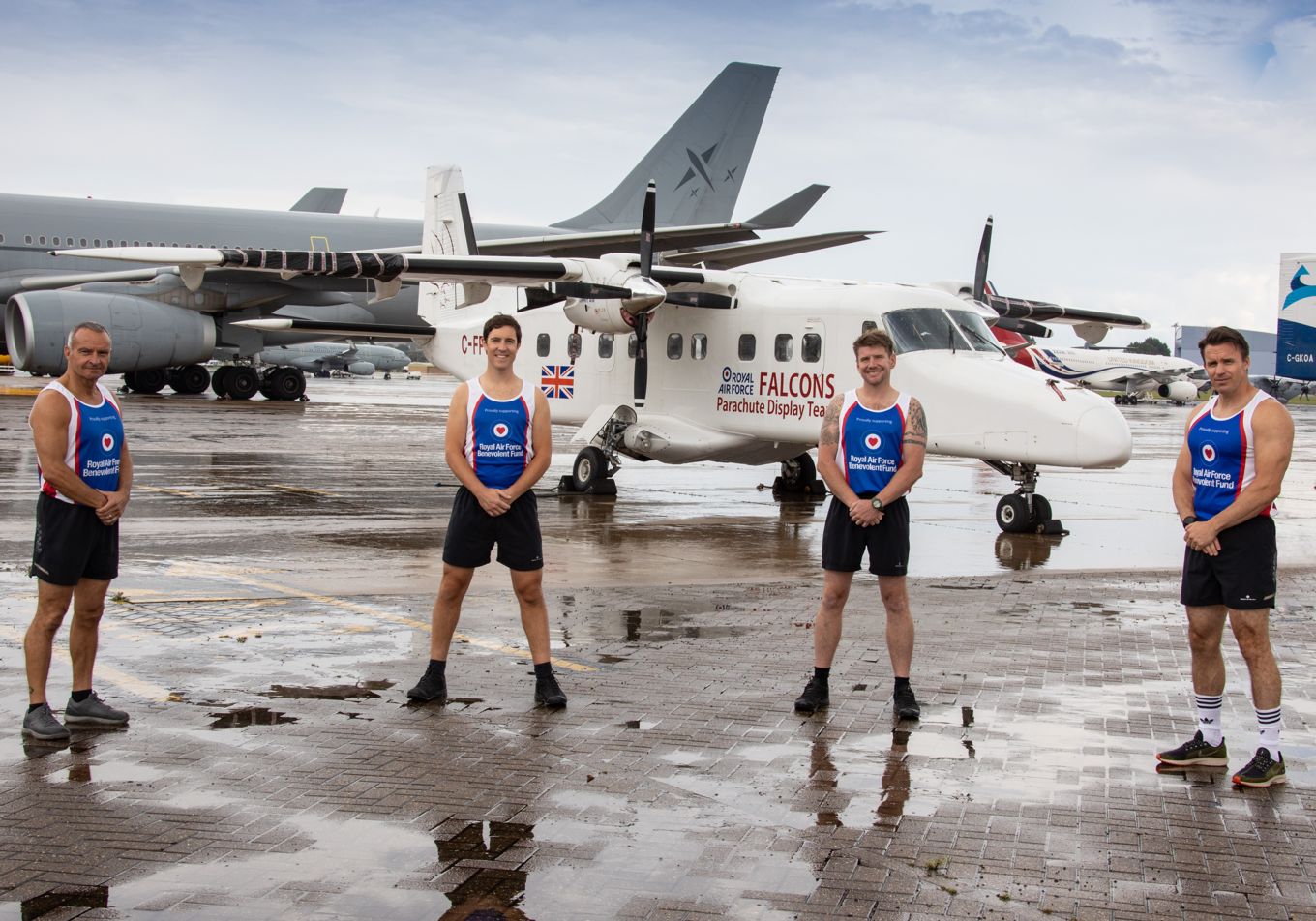 Pictured some members of the RAF Falcons outside their Dornier aircraft who took part in the Hardest Day Challenge