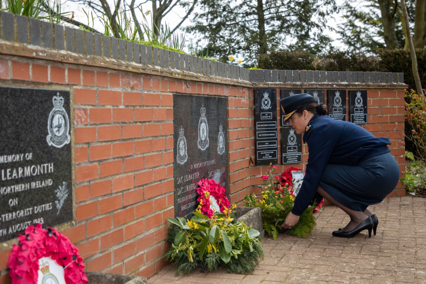 Reviewing Officer Air Commodore Marshall at RAF Honington Memorial Garden laying a Wreath