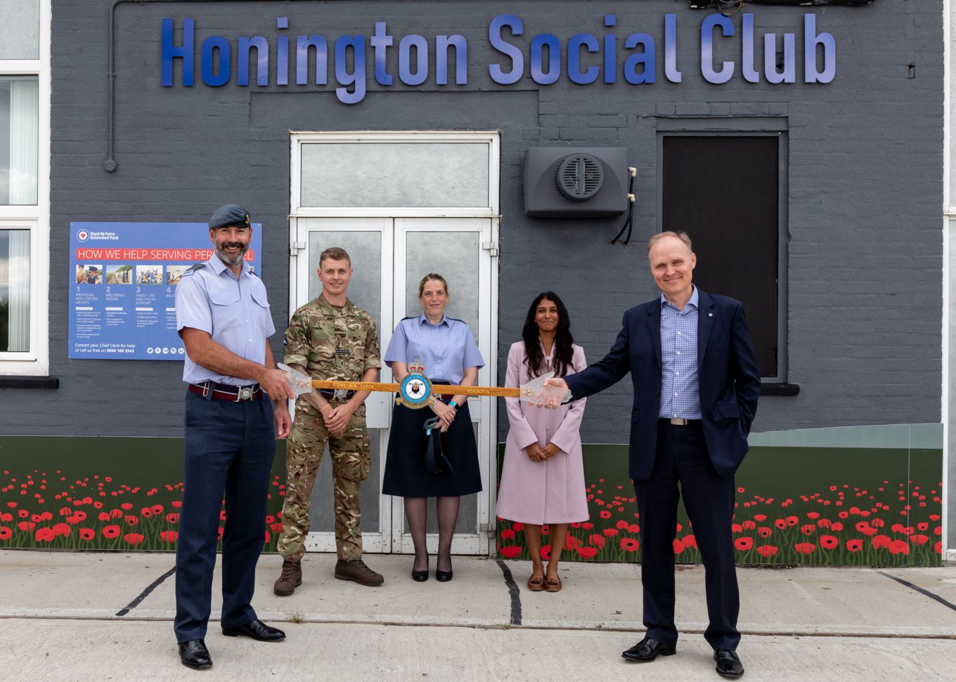 Station Commander Gp Capt Holland (Front Left) and RAFBF Director of Fundraising and Communications Jason Shauness (front right), Back row L-R: Club OIC FO Houghton, OC Support Wing Wg Cdr English, RAFBF Regional Communications Manager Hemma Gooljar