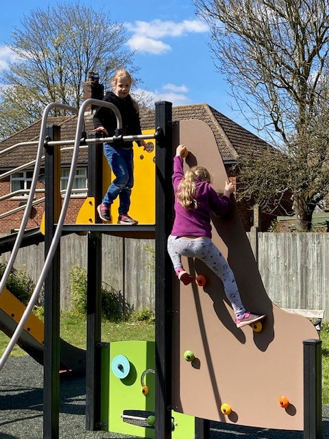 Katy and Lucy demonstrate how to have fun at the new playpark