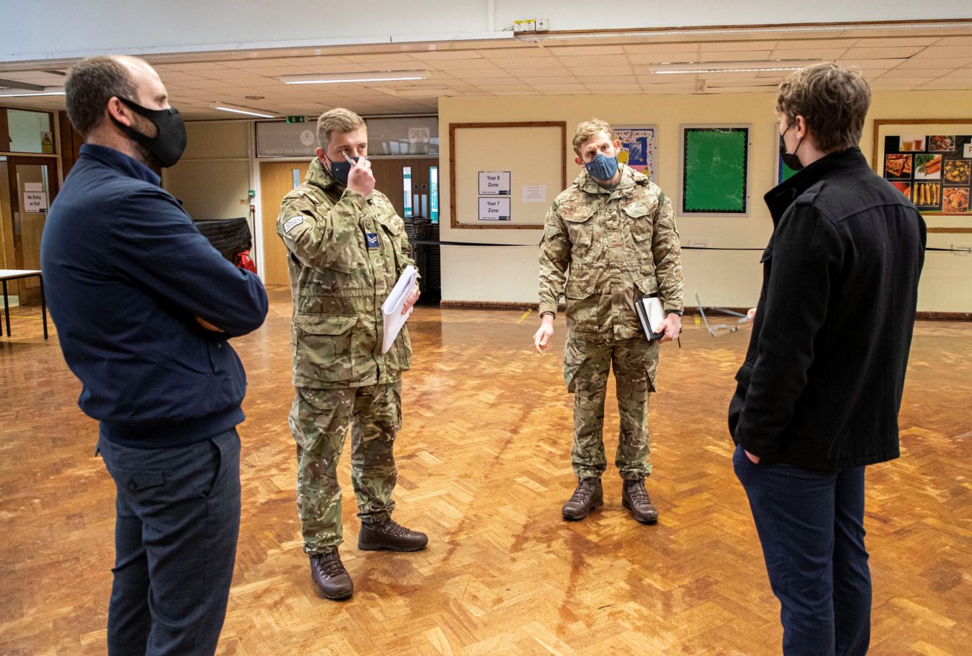 RAF Personnel talking with staff at Philip Morant School and College