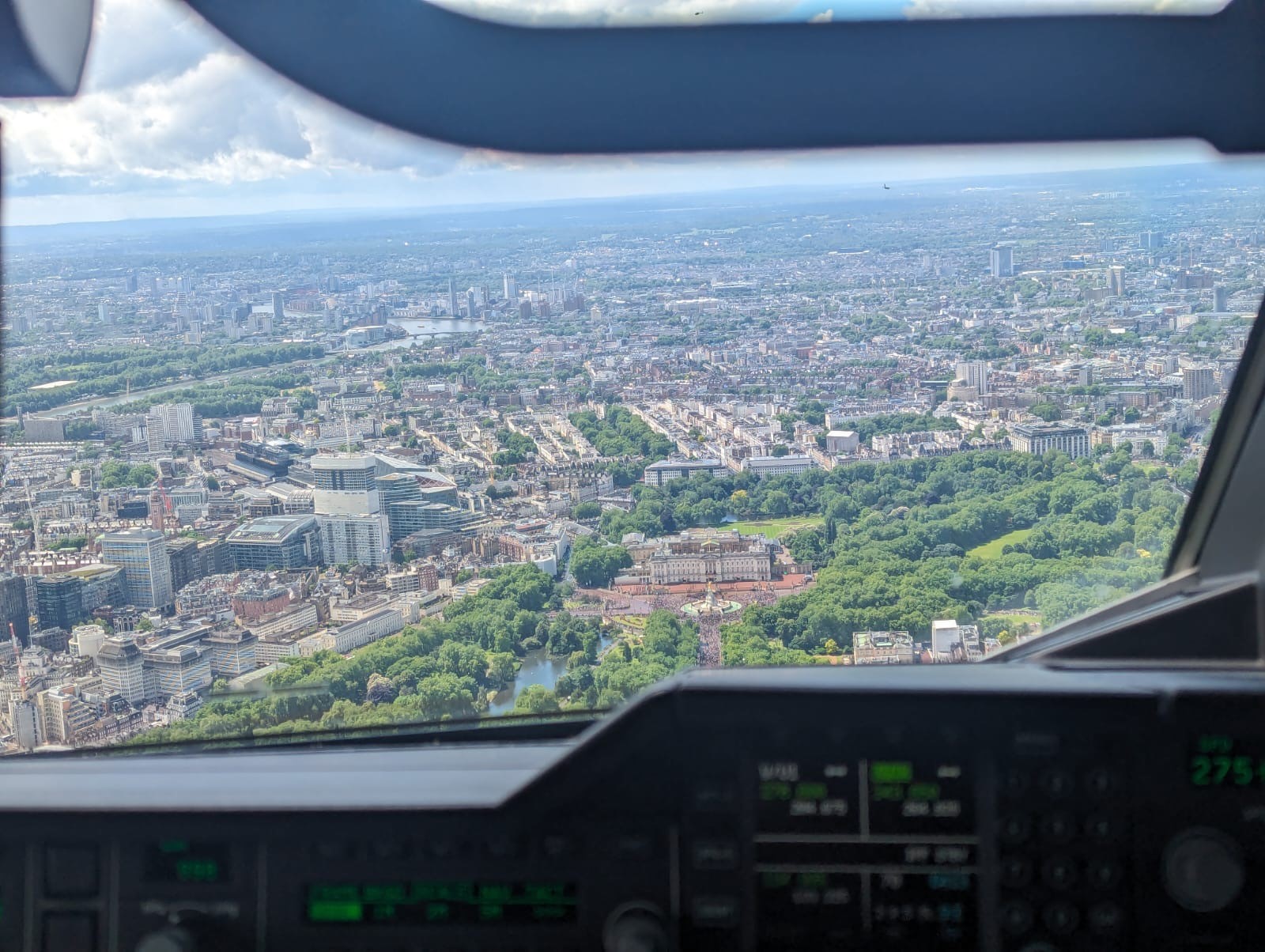 Image shows Buckingham Palace from the cockpit of an RAF A400M Atlas aircraft.