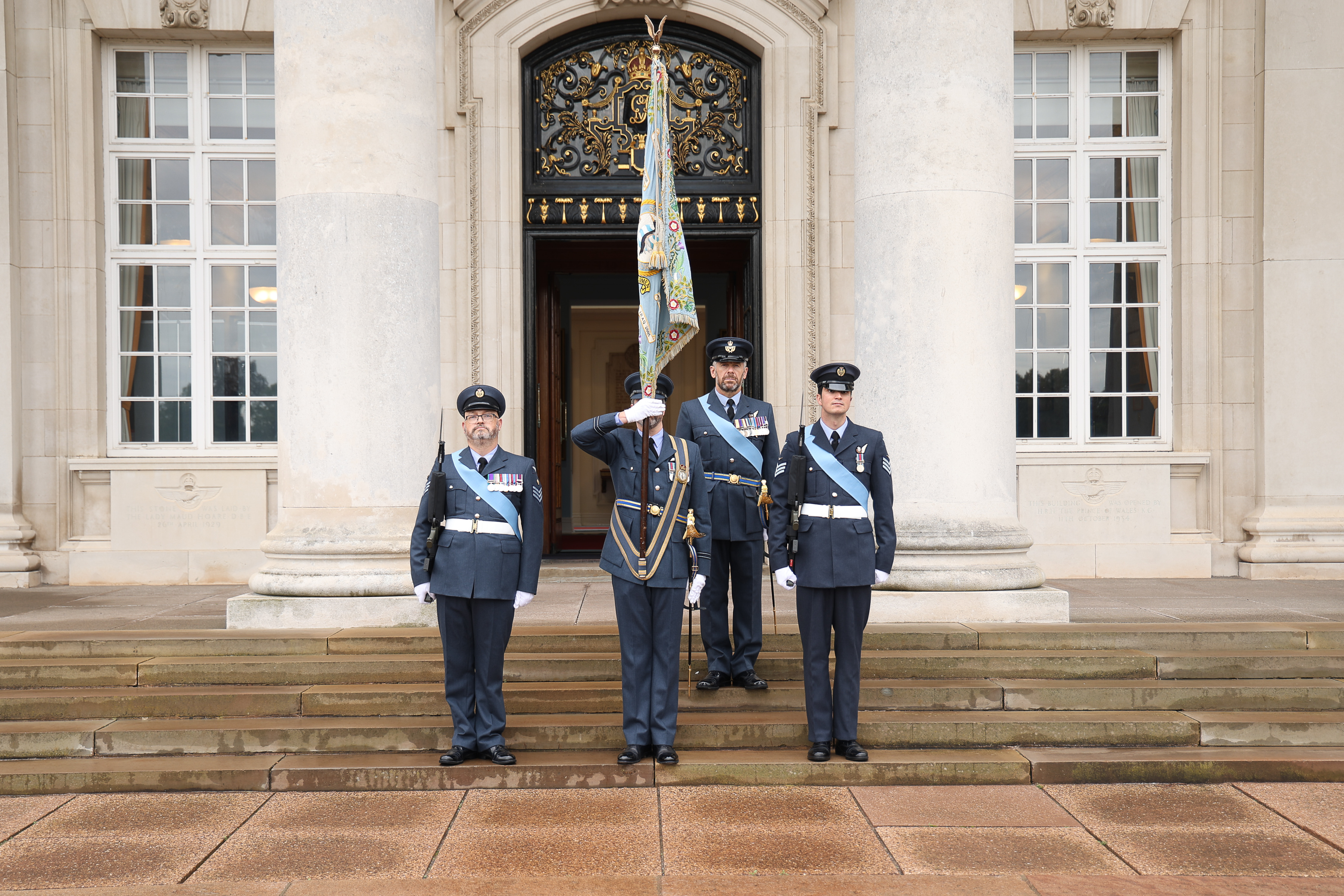 No.47 Squadron standard presented outside College Hall with a guard of 3 ceremonial personnel