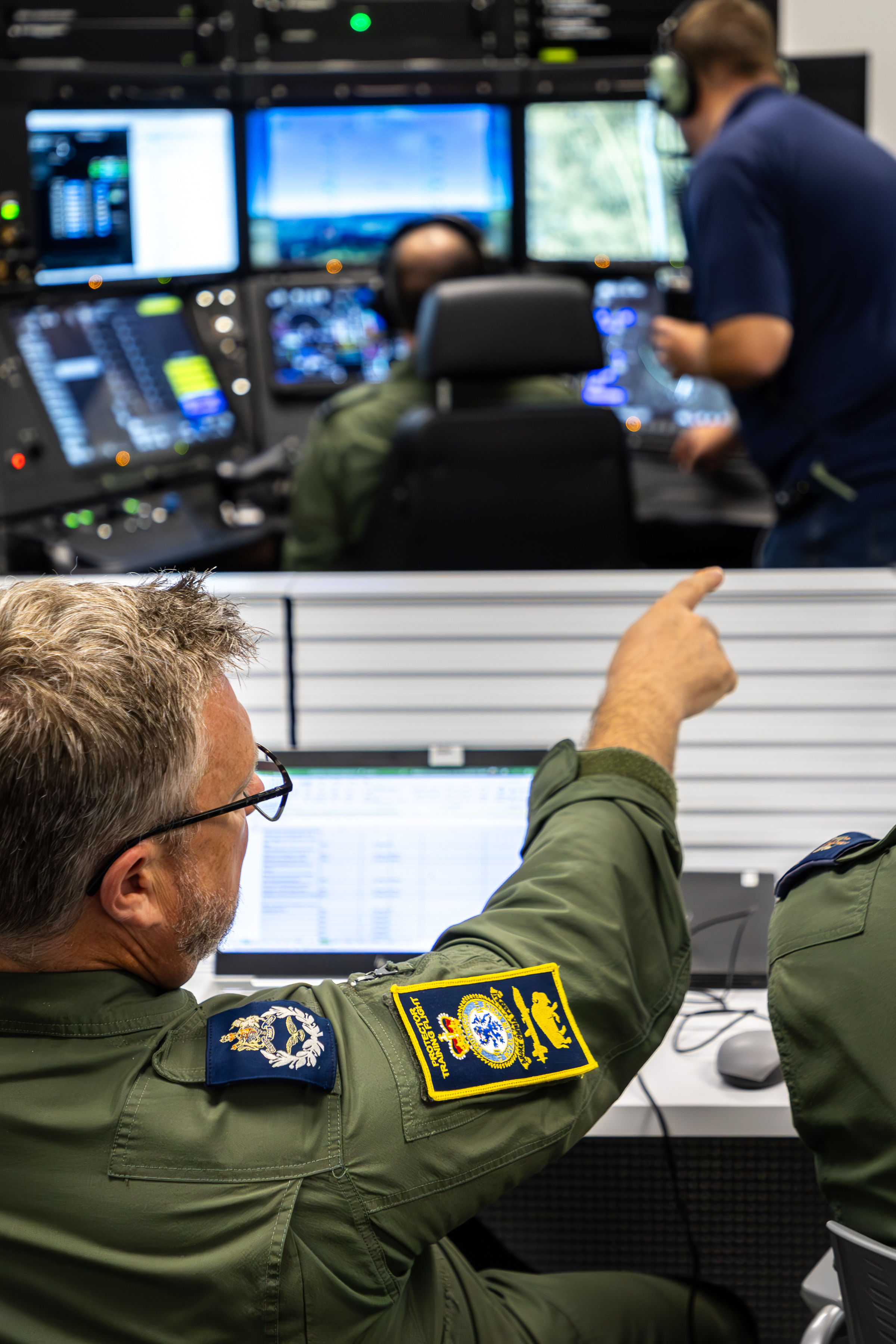 RAF Personnel assessing the simulator training