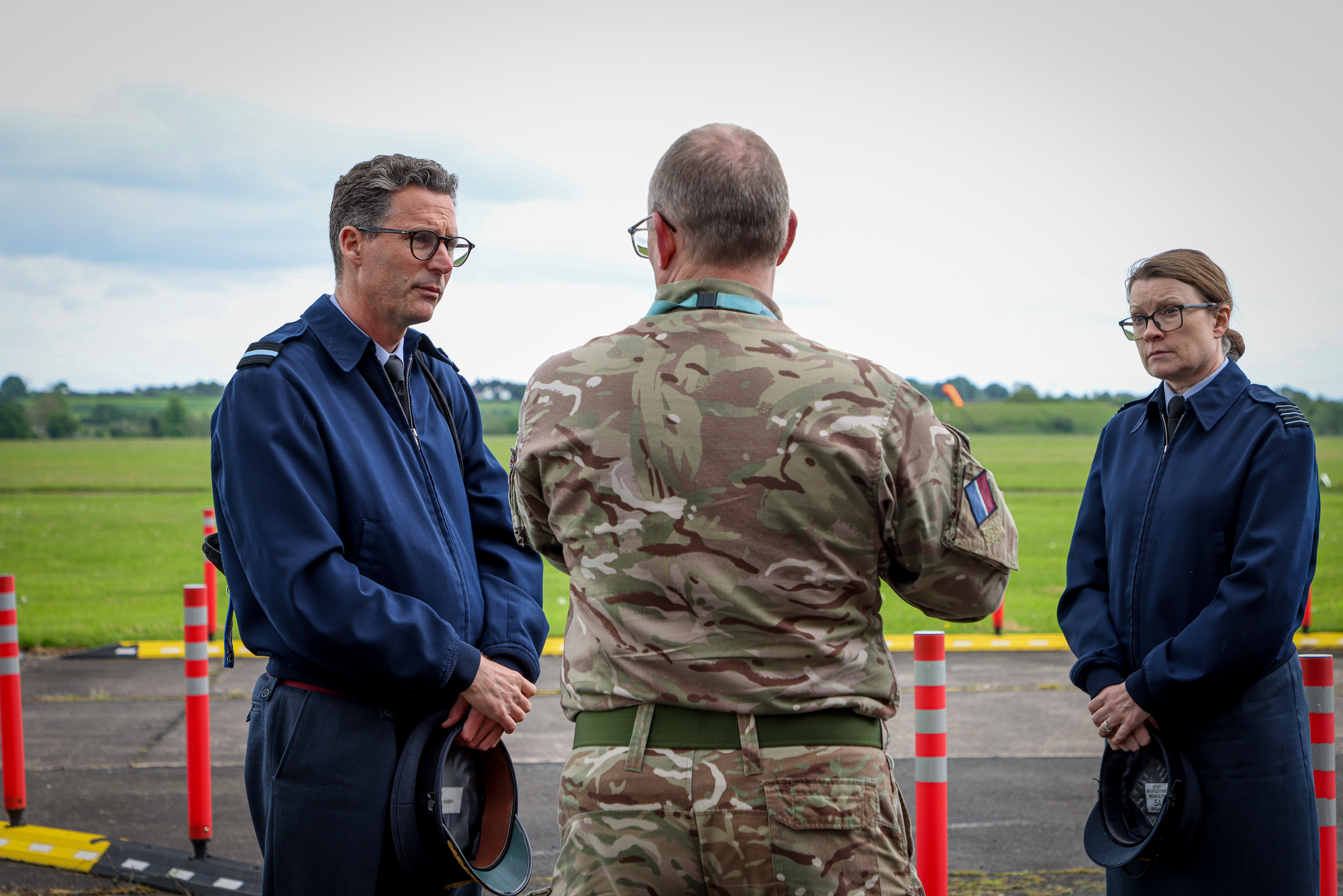 Air Commodore Portlock on the airfield of RAF Cosford with staiton executives