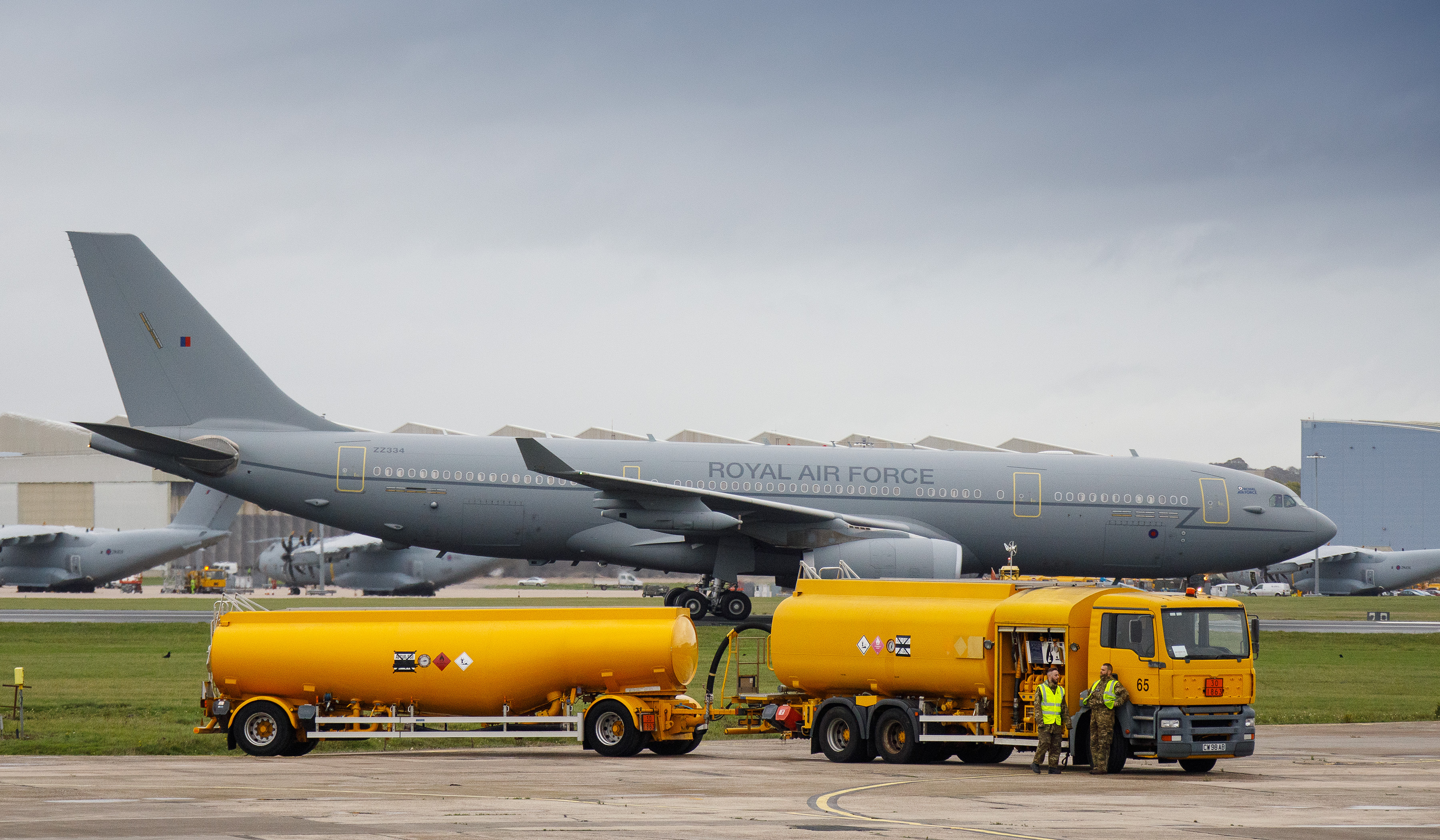 Image shows an RAF Voyager aircraft with fuel trucks in the foreground.