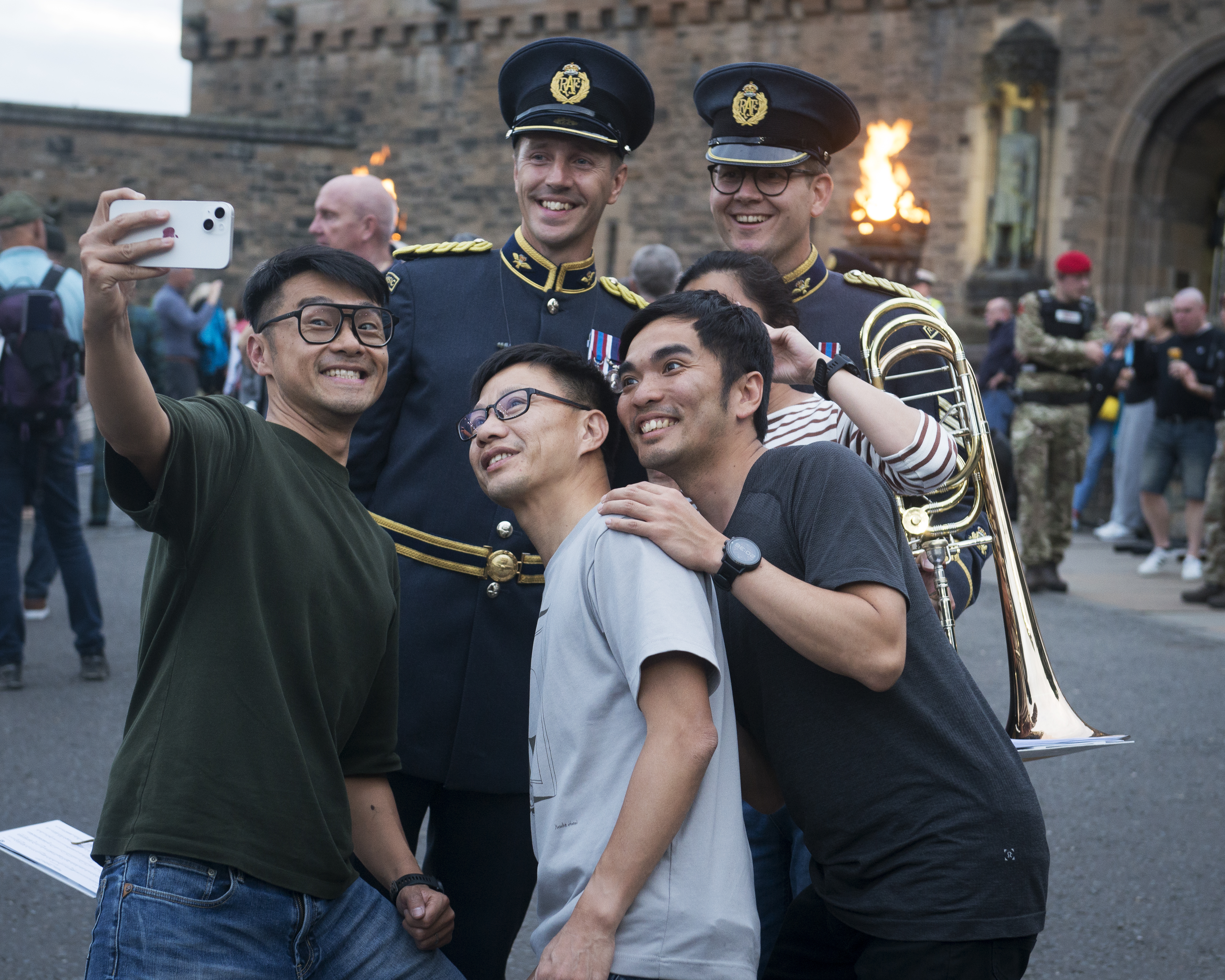 Tourists taking a selfie with some RAF Band members