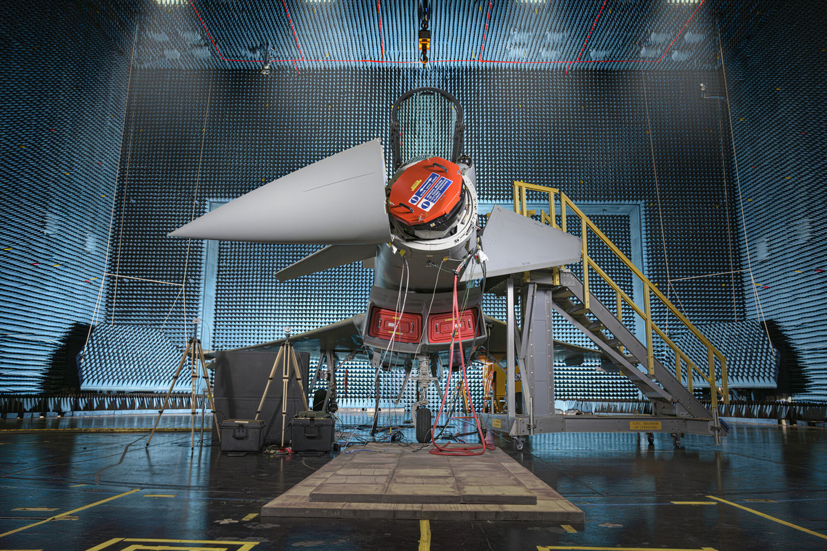 Aircraft being worked on, with parts taken apart.