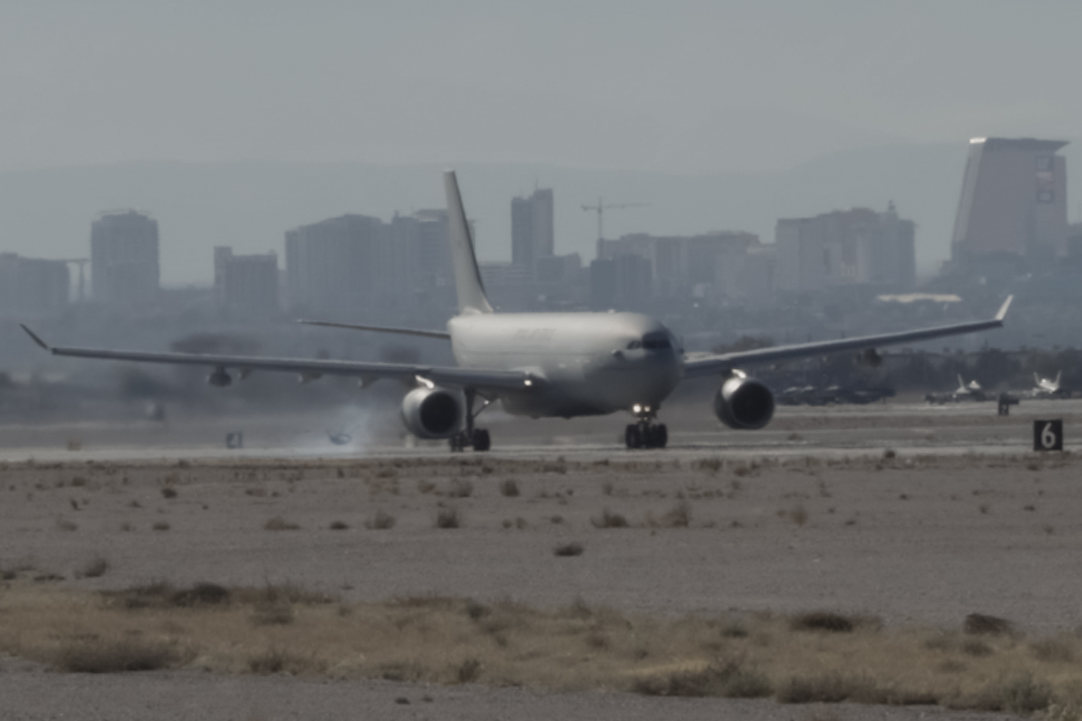 Voyager on the runway, with blown out tyre