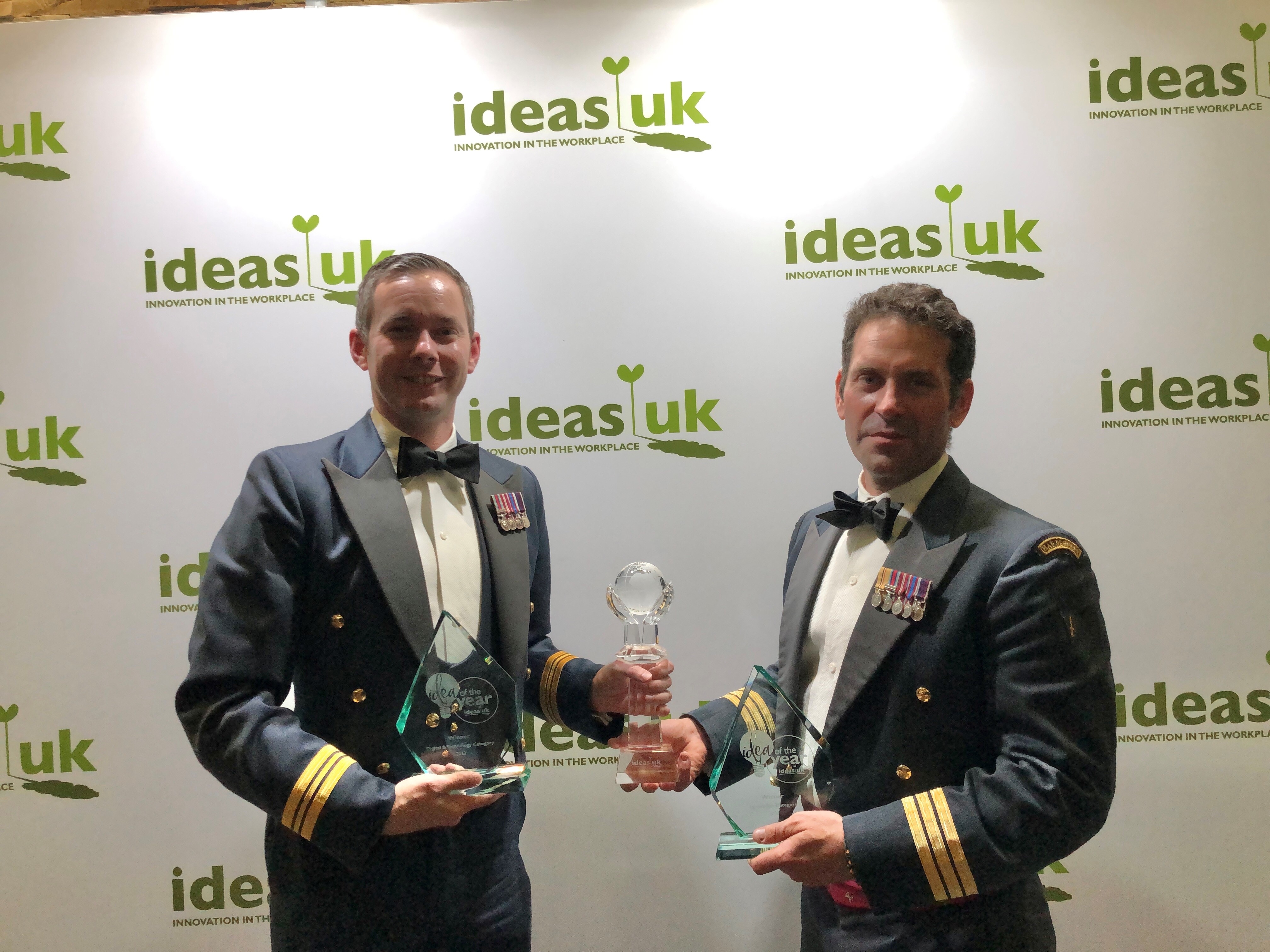 Wg Cdr Casson and Sqn Ldr Palfrey pose with their trophy
